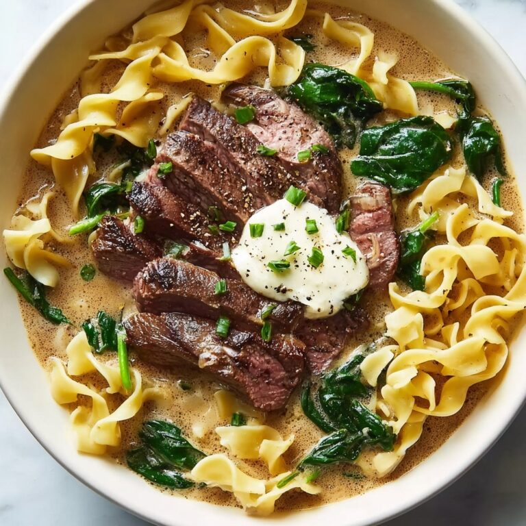 Garlic Butter Steak with Egg Noodles and Spinach Salad Recipe